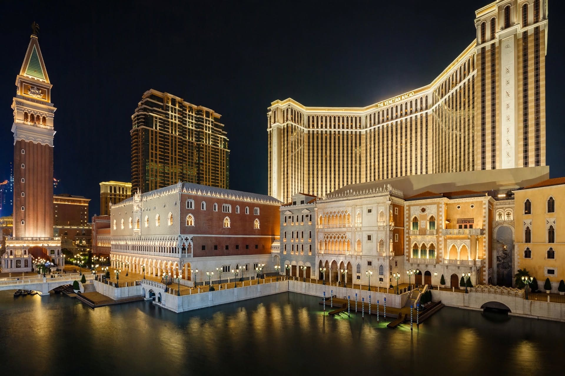 Monumental Venetian Renaissance inspired architecture along the illuminated Cotai Strip